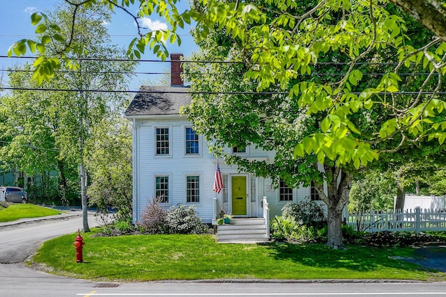 86 High St, Belfast, ME 04915 - colonial home featuring a chimney