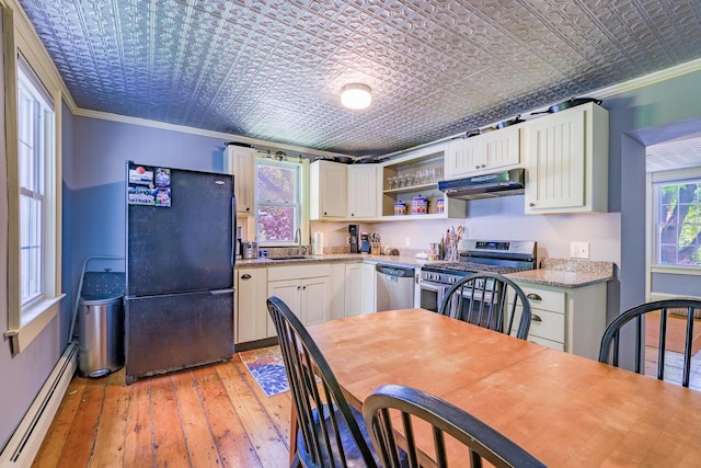 86 High St, Belfast, ME 04915 - kitchen with appliances with stainless steel finishes, an ornate ceiling, a baseboard heating unit, under cabinet range hood, and ornamental molding