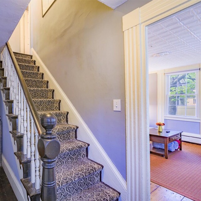 86 High St, Belfast, ME 04915 - stairs with wood finished floors and baseboards