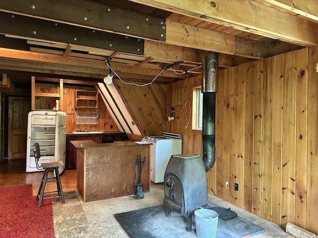 267 Tufts Pond Rd, Kingfield, ME 04947 - bar area featuring a wood stove and wooden walls