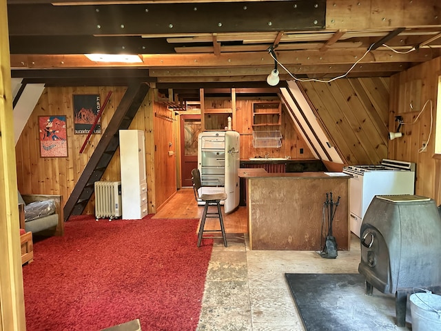 267 Tufts Pond Rd, Kingfield, ME 04947 - unfinished attic featuring radiator heating unit