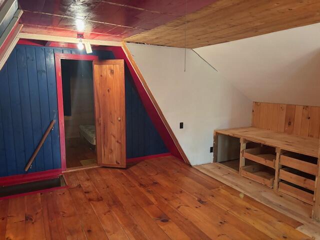 267 Tufts Pond Rd, Kingfield, ME 04947 - bonus room featuring hardwood / wood-style floors and vaulted ceiling