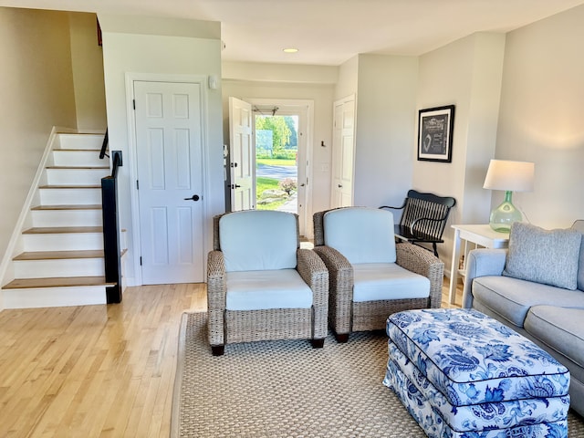 43 Eastward Unit 43, Rockport, ME 04856 - living area with light wood-style floors, stairway, and recessed lighting