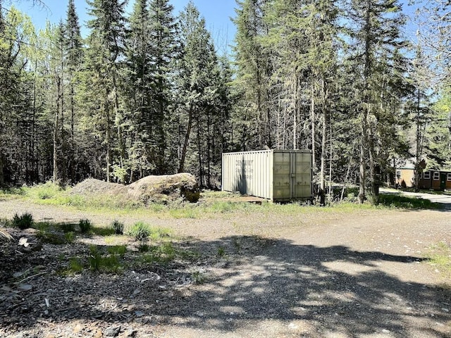 133 Camp Waya-Awi Rd, Rangeley, ME 04970 - view of yard with a wooded view