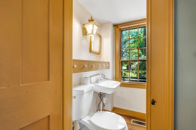 16 Old Village Rd, Winthrop, ME 04364 - bathroom with wood finished floors and baseboards