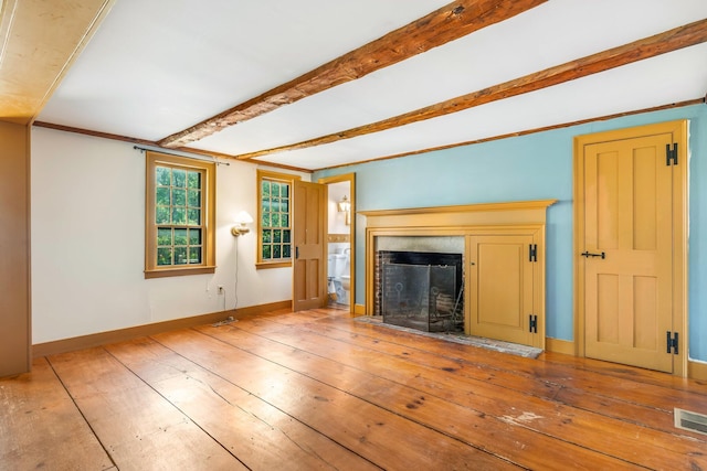 16 Old Village Rd, Winthrop, ME 04364 - unfurnished living room with a fireplace and hardwood / wood-style floors