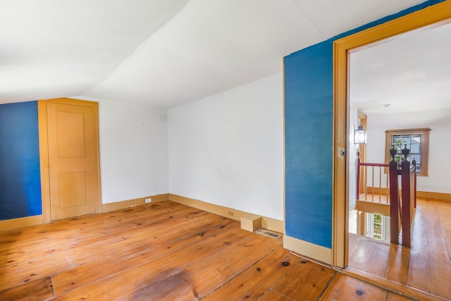 16 Old Village Rd, Winthrop, ME 04364 - bonus room featuring hardwood / wood-style floors and lofted ceiling