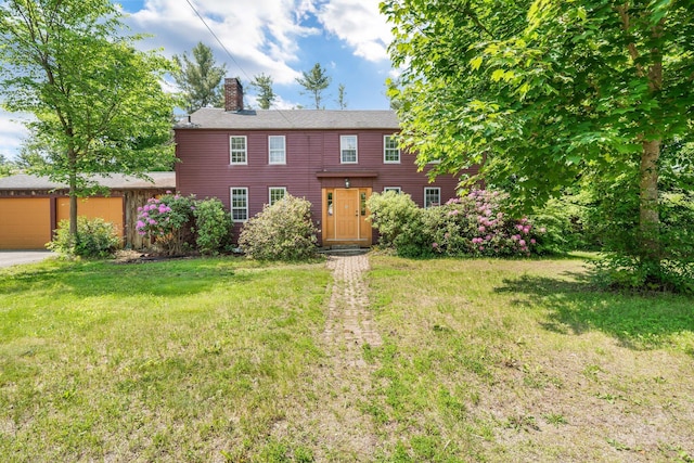 16 Old Village Rd, Winthrop, ME 04364 - colonial inspired home featuring a chimney, an attached garage, a front lawn, and driveway