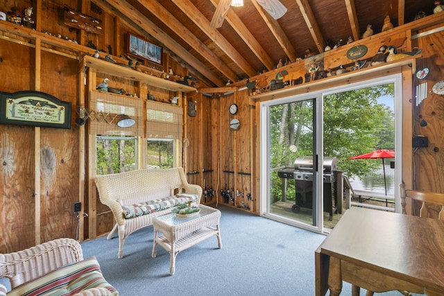 7 Kincaid Ln, Newfield, ME 04095 - carpeted living room with lofted ceiling, wood walls, and ceiling fan