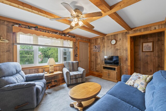 7 Kincaid Ln, Newfield, ME 04095 - living area with wood walls, light carpet, beam ceiling, ceiling fan, and coffered ceiling