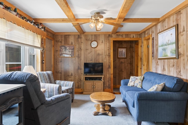 7 Kincaid Ln, Newfield, ME 04095 - living area with wooden walls, coffered ceiling, beamed ceiling, a ceiling fan, and light carpet