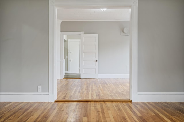 2 Stobie St, Winslow, ME 04901 - empty room with ornamental molding and hardwood / wood-style floors