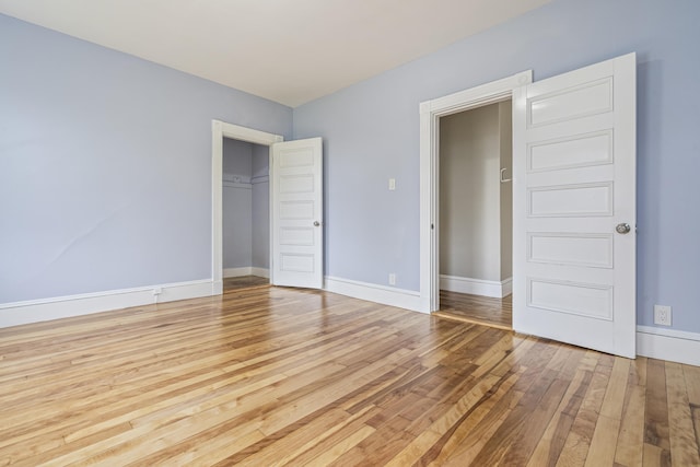 2 Stobie St, Winslow, ME 04901 - unfurnished bedroom featuring wood-type flooring and a closet