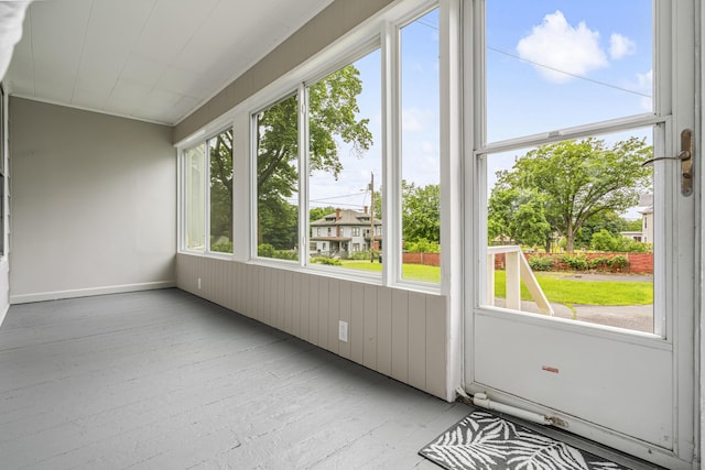 2 Stobie St, Winslow, ME 04901 - unfurnished sunroom with wood-type flooring