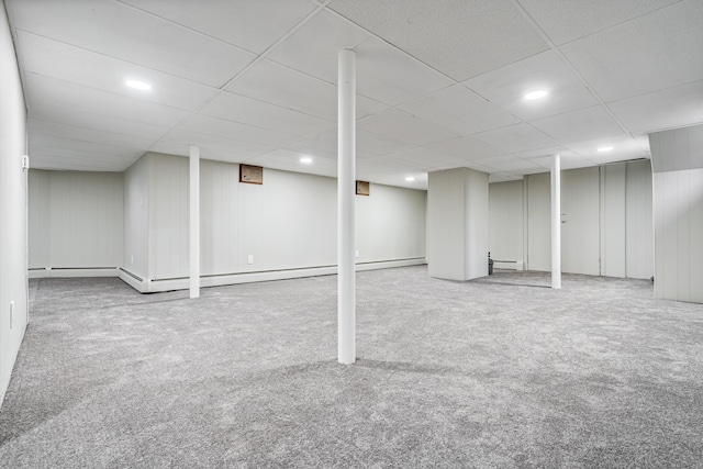 2 Stobie St, Winslow, ME 04901 - finished basement with carpet flooring, recessed lighting, a paneled ceiling, and a baseboard heating unit