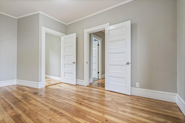 2 Stobie St, Winslow, ME 04901 - spare room featuring wood finished floors and crown molding