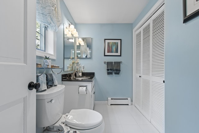 6 Hackmatack Dr, Scarborough, ME 04074 - bathroom with baseboard heating, a closet, and vanity