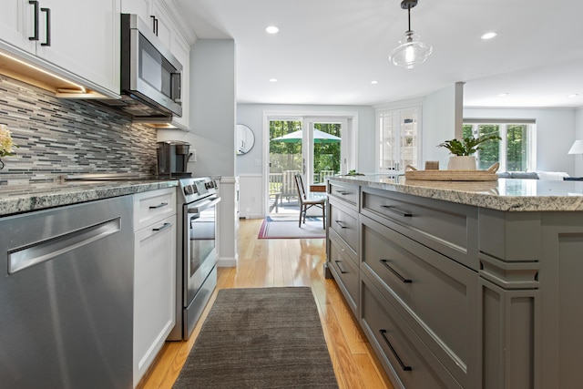 6 Hackmatack Dr, Scarborough, ME 04074 - kitchen with appliances with stainless steel finishes, plenty of natural light, gray cabinetry, light wood-style floors, and recessed lighting