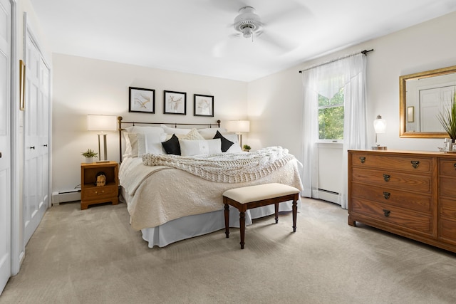 6 Hackmatack Dr, Scarborough, ME 04074 - bedroom with a baseboard heating unit, light colored carpet, and ceiling fan