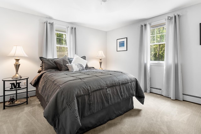 6 Hackmatack Dr, Scarborough, ME 04074 - bedroom with light colored carpet, multiple windows, and a baseboard radiator