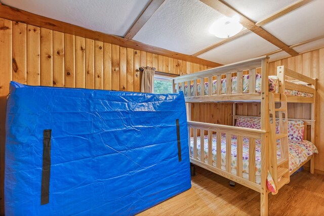 60 Watson Hill Rd, Limerick, ME 04048 - bedroom featuring wooden walls and wood finished floors
