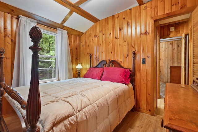 60 Watson Hill Rd, Limerick, ME 04048 - bedroom with vaulted ceiling, wood walls, and wood finished floors