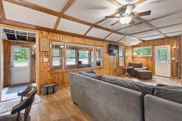 60 Watson Hill Rd, Limerick, ME 04048 - living room with wood walls, plenty of natural light, light wood finished floors, and ceiling fan