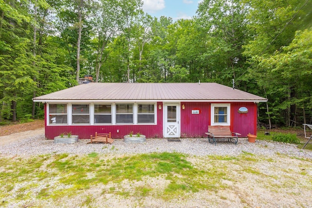 60 Watson Hill Rd, Limerick, ME 04048 - view of front of house with a metal roof and a chimney
