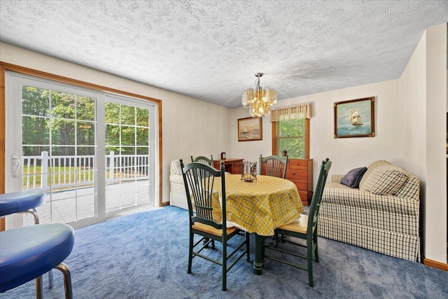 52 Douglas Ave, Saco, ME 04072 - dining room featuring carpet, a chandelier, and a textured ceiling