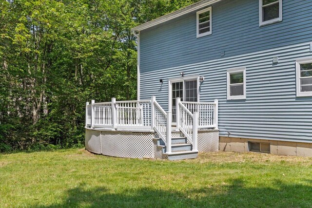 52 Douglas Ave, Saco, ME 04072 - rear view of house with a wooden deck and a lawn