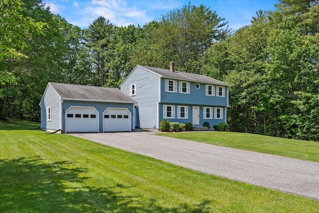 52 Douglas Ave, Saco, ME 04072 - colonial home featuring a chimney, a garage, and a front yard