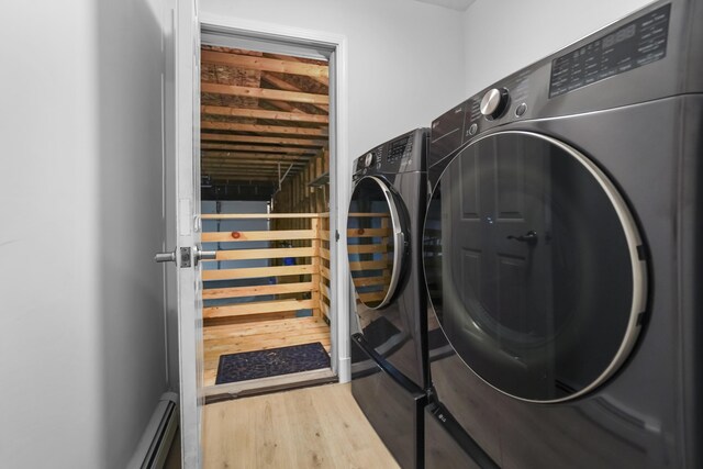 282 Back Narrows Rd, Boothbay, ME 04537 - washroom with wood finished floors and separate washer and dryer