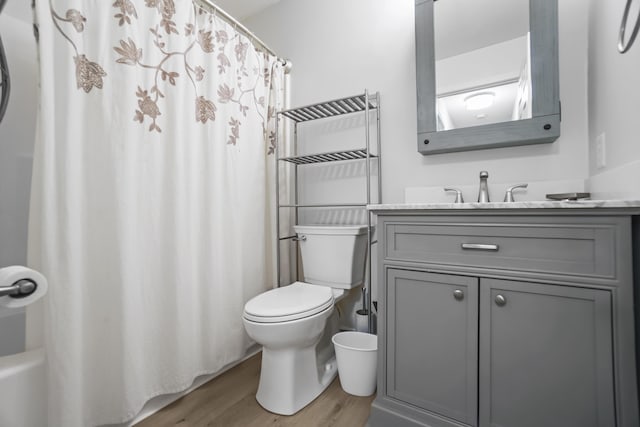 282 Back Narrows Rd, Boothbay, ME 04537 - full bath featuring wood finished floors, vanity, and shower / tub combo