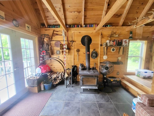 40 Griffin Mountain Rd, New Vineyard, ME 04956 - interior space with wooden walls, wood ceiling, and a wood stove