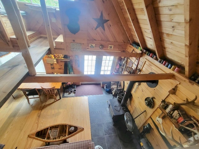 40 Griffin Mountain Rd, New Vineyard, ME 04956 - living area featuring lofted ceiling, wooden walls, and wooden ceiling
