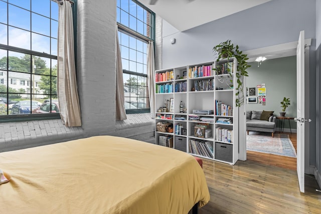 30 Lincoln St Unit 109, Westbrook, ME 04092 - bedroom featuring hardwood / wood-style floors and a high ceiling
