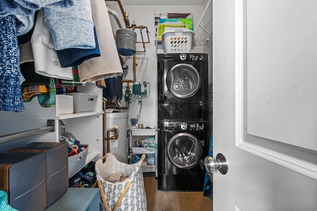 30 Lincoln St Unit 109, Westbrook, ME 04092 - laundry area featuring stacked washer / drying machine, wood finished floors, and gas water heater
