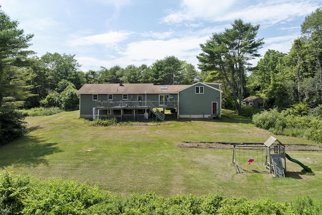 474 Center St, Nobleboro, ME 04555 - back of house with a wooden deck, stairway, and a lawn