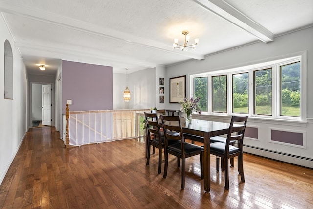 474 Center St, Nobleboro, ME 04555 - dining space featuring beam ceiling, a chandelier, hardwood / wood-style floors, a baseboard heating unit, and arched walkways