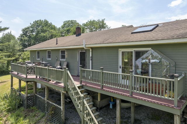 474 Center St, Nobleboro, ME 04555 - back of property with a deck, a chimney, and a shingled roof