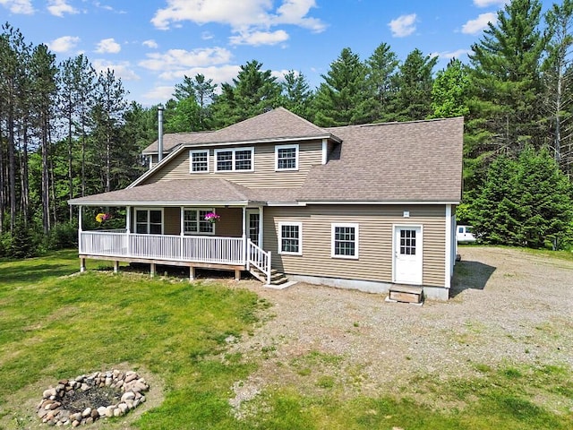 43 Brookside Ln, Freeman Twp, ME 04983 - view of front facade with a front lawn, a shingled roof, and entry steps