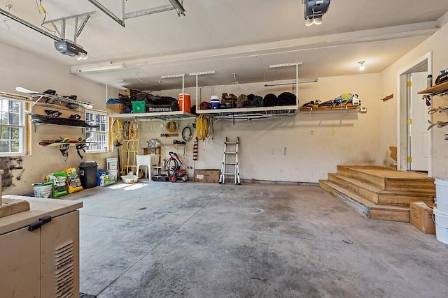 43 Brookside Ln, Freeman Twp, ME 04983 - garage featuring a garage door opener
