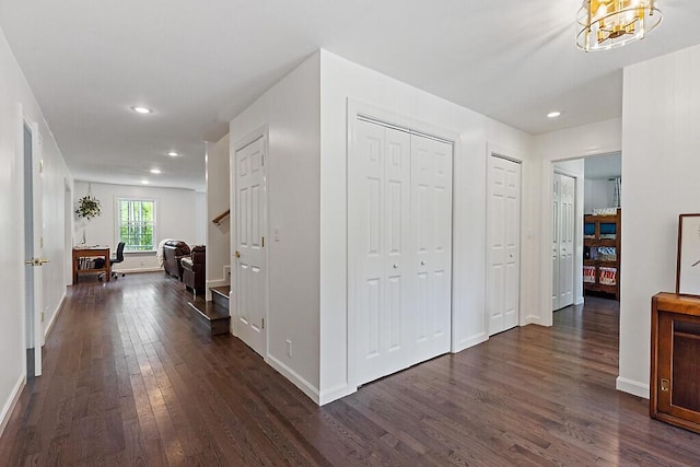 43 Brookside Ln, Freeman Twp, ME 04983 - hall featuring dark wood-style floors, recessed lighting, and a chandelier