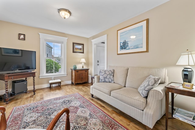 223 Centre St, Bath, ME 04530 - living area featuring hardwood / wood-style flooring and baseboards