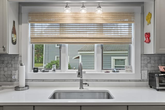 223 Centre St, Bath, ME 04530 - kitchen featuring light countertops and tasteful backsplash
