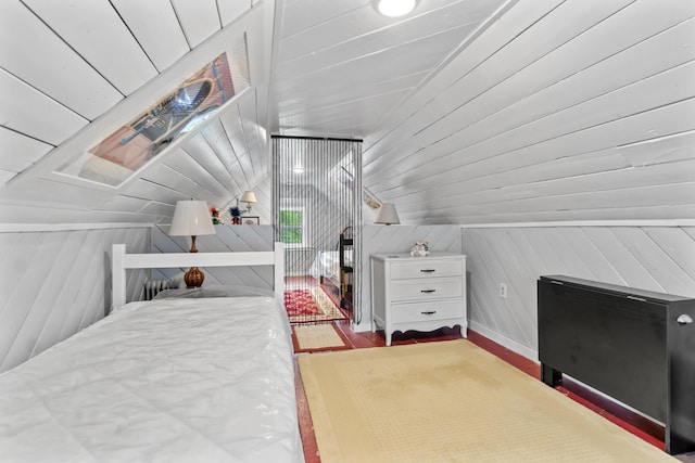 223 Centre St, Bath, ME 04530 - bedroom with lofted ceiling, wood finished floors, and wood walls