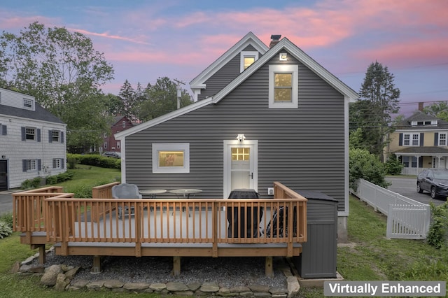 223 Centre St, Bath, ME 04530 - back of house at dusk with a deck and a chimney