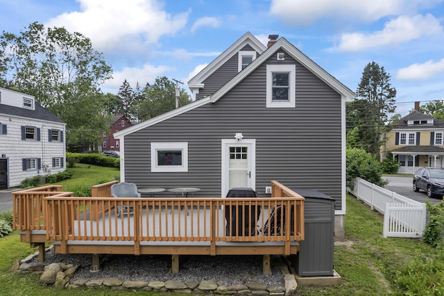 223 Centre St, Bath, ME 04530 - back of property featuring a deck and a chimney