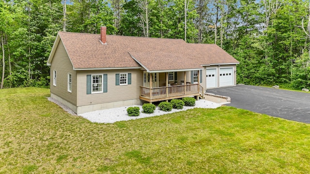 5 Willard Way, Raymond, ME 04071 - view of front of house featuring a shingled roof, an attached garage, a front lawn, and a porch