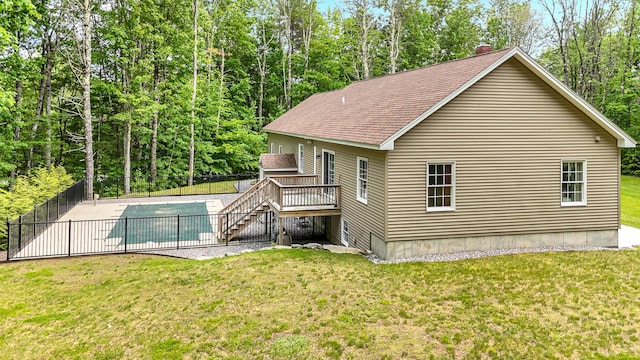 5 Willard Way, Raymond, ME 04071 - back of property with a wooden deck, roof with shingles, and stairs